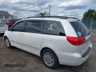 2009 Toyota Sienna XLE with VIN 5TDZK22C79S259793, listed as a IAAI auction lot 41905617 with 185,121 mi miles and . Bid and sale history available at DreamBid. Image 3.