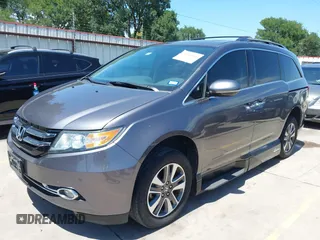 2015 Honda Odyssey Touring Elite z VIN 5FNRL5H99FB017517, wystawiony jako IAAI lot #42246066 z przebiegiem 104 878 mil mil oraz . Historia ofert i sprzedaży dostępna na DreamBid. Obrazek 2.