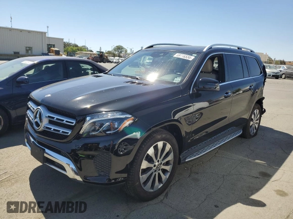 2018 Mercedes-Benz GLS 450 with VIN 4JGDF6EE0JB180847, listed as a Copart auction lot 69716534 with 50,104 mi miles and Salvage Title. Bid and sale history available at DreamBid. Image 1.