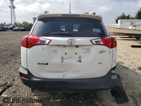 2014 Toyota RAV4 LE with VIN JTMZFREV9EJ020862, listed as a Copart auction lot 63983635 with 170,148 mi miles and Salvage title. Bid and sale history available at DreamBid. Image 6.