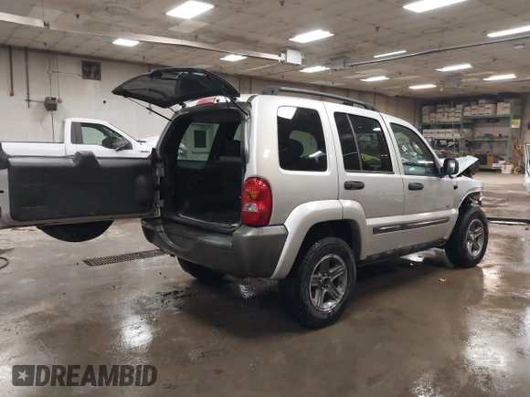 2004 Jeep Liberty Sport with VIN 1J4GL48K44W182897, listed as a IAAI auction lot 40768956 with 241,550 mi miles and . Bid and sale history available at DreamBid. Image 4.