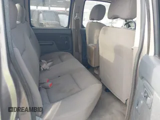 2003 Nissan Frontier XE z VIN 1N6ED27T13C404348, wystawiony jako IAAI lot #41952112 z przebiegiem Nie podano mil oraz . Historia ofert i sprzedaży dostępna na DreamBid. Obrazek 8.