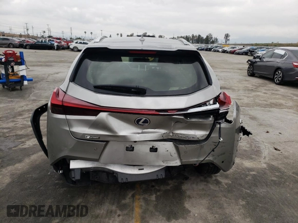 2021 Lexus UX with VIN JTHE9JBH2M2051660, listed as a Copart auction lot 44171883 with 13,471 mi miles. Bid and sale history available at carsss.com. Image 6.