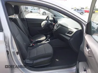 2022 Hyundai Accent SE with VIN 3KPC24A67NE167746, listed as a IAAI auction lot 42054225 with 25,883 mi miles and . Bid and sale history available at carsss.com. Image 5.