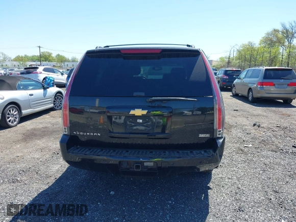 2012 Chevrolet Suburban LT with VIN 1GNSCJE09CR168533, listed as a IAAI auction lot 42142325 with 250,582 mi miles. Bid and sale history available at carsss.com. Image 16.