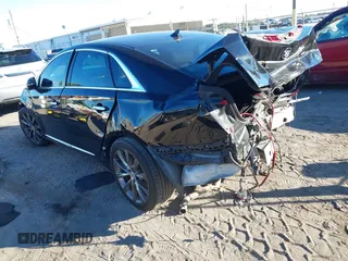 2014 Cadillac XTS with VIN 2G61L5S34E9261034, listed as a IAAI auction lot 41250779 with 178,218 mi miles. Bid and sale history available at carsss.com. Image 3.