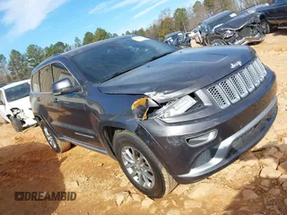 2015 Jeep Grand Cherokee Summit with VIN 1C4RJFJG8FC679185, listed as a IAAI auction lot 41653531 with 158,186 mi miles and . Bid and sale history available at DreamBid. Image 1.