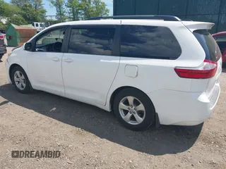 2015 Toyota Sienna LE AAS with VIN 5TDKK3DC1FS599053, listed as a IAAI auction lot 42216805 with 167,280 mi miles and . Bid and sale history available at DreamBid. Image 3.