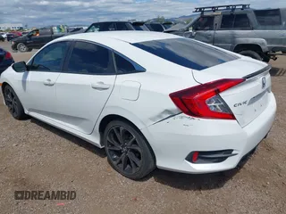 2019 Honda Civic Sport with VIN 2HGFC2F85KH600037, listed as a IAAI auction lot 42030526 with 82,821 mi miles and . Bid and sale history available at DreamBid. Image 3.