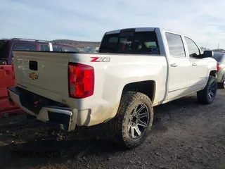 2018 Chevrolet Silverado 1500 LTZ with VIN 3GCUKSEC8JG487892, listed as a IAAI auction lot 41488036 with 142,559 mi miles. Bid and sale history available at carsss.com. Image 4.