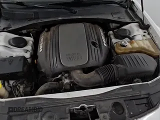 2014 Chrysler 300 C z VIN 2C3CCAKT8EH229468, wystawiony jako Copart lot #69706705 z przebiegiem 161 610 mil mil oraz Czysty tytuł • Clean title. Historia ofert i sprzedaży dostępna na DreamBid. Obrazek 14.