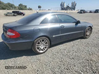 2009 Mercedes-Benz CLK 350 with VIN WDBTJ56H99F261060, listed as a Copart auction lot 69812004 with 105,218 mi miles and Salvage Title. Bid and sale history available at carsss.com. Image 3.