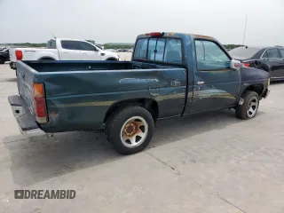 1994 Nissan Frontier with VIN 1N6SD11S2RC341136, listed as a Copart auction lot 57107995 with 174,479 mi miles and Salvage title. Bid and sale history available at DreamBid. Image 3.