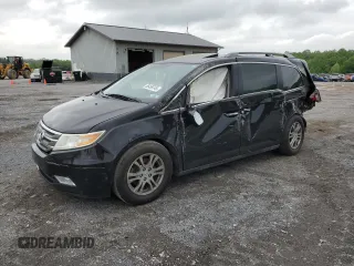 2013 Honda Odyssey EX-L with VIN 5FNRL5H69DB031498, listed as a Copart auction lot 55459745 with 129,773 mi miles and Salvage title. Bid and sale history available at DreamBid. Image 1.