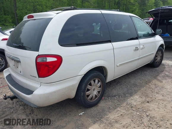 2006 Chrysler Town & Country Touring with VIN 2A4GP54L46R859144, listed as a IAAI auction lot 42037427 with 265,354 mi miles and . Bid and sale history available at DreamBid. Image 4.