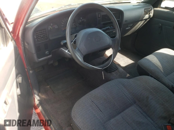 1993 Toyota Pickup DLX z VIN JT4RN93P6P5087700, wystawiony jako Copart lot #72069284 z przebiegiem 219 137 mil mil oraz Szkoda całkowita • Salvage title. Historia ofert i sprzedaży dostępna na DreamBid. Obrazek 8.