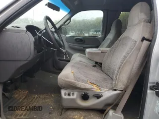 1999 Ford F-150 XL с VIN 1FTRX18L5XNB35835, выставлен на аукционе Copart как лот 52898645 с пробегом 218 637 миль миль и Списание • Salvage title. История ставок и продаж доступна на DreamBid. Изображение 7.