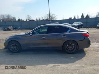 2014 Infiniti Q50 Hybrid Sport with VIN JN1AV7AR7EM703030, listed as a IAAI auction lot 41661844 with 128,202 mi miles. Bid and sale history available at carsss.com. Image 14.