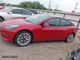 2023 Tesla Model 3 with VIN 5YJ3E1EAXPF447680, listed as a IAAI auction lot 41961496 with 37,589 mi miles. Bid and sale history available at carsss.com. Image 13.