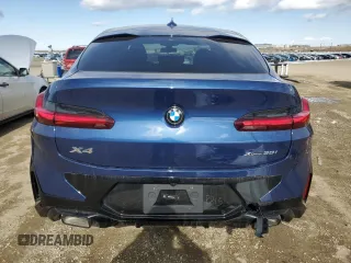 2025 BMW X4 xDrive30i with VIN 5UX33DT05S9Y19798, listed as a Copart auction lot 51861845 with 718 mi miles and Salvage Title. Bid and sale history available at carsss.com. Image 6.