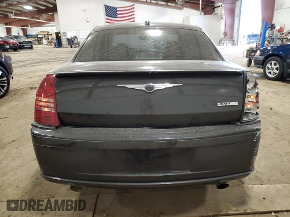2006 Chrysler 300 C SRT8 with VIN 2C3LA73WX6H106631, listed as a Copart auction lot 50715715 with 104,990 mi miles and Clean Title. Bid and sale history available at carsss.com. Image 6.