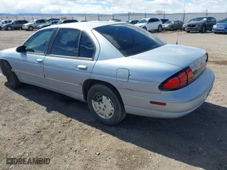 1997 Chevrolet Lumina with VIN 2G1WL52M5V9216883, listed as a IAAI auction lot 41797511 with 231,779 mi miles. Bid and sale history available at carsss.com. Image 3.