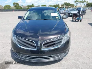 2014 Lincoln MKS with VIN 1LNHL9EK0EG608300, listed as a IAAI auction lot 41900902 with 144,253 mi miles. Bid and sale history available at carsss.com. Image 12.