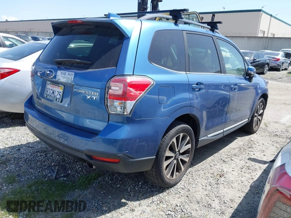 2018 Subaru Forester Touring with VIN JF2SJGWC8JH414373, listed as a IAAI auction lot 41718823 with 22,552 mi miles. Bid and sale history available at carsss.com. Image 4.
