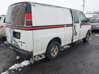 2006 Chevrolet Express Cargo Van with VIN 1GCFG15X261155976, listed as a IAAI auction lot 41562836 with 295,351 mi miles. Bid and sale history available at carsss.com. Image 4.