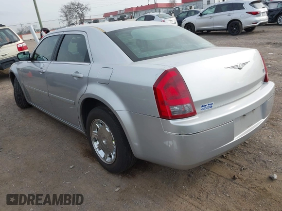 2005 Chrysler 300 with VIN 2C3JA53G85H159623, listed as a IAAI auction lot 41773424 with 127,764 mi miles. Bid and sale history available at carsss.com. Image 3.