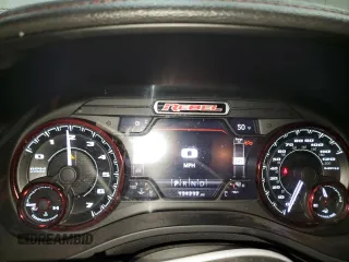 2019 Ram 1500 Rebel z VIN 1C6SRFLT3KN671103, wystawiony jako Copart lot #49518485 z przebiegiem 134 232 mil mil oraz Czysty tytuł • Clean title. Historia ofert i sprzedaży dostępna na DreamBid. Obrazek 9.