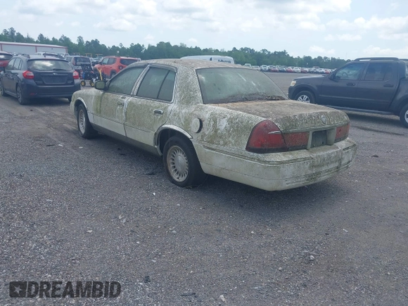 2001 Mercury Grand Marquis LS with VIN 2MEFM75WX1X633210, listed as a IAAI auction lot 42092135 with 161,963 mi miles and . Bid and sale history available at DreamBid. Image 3.