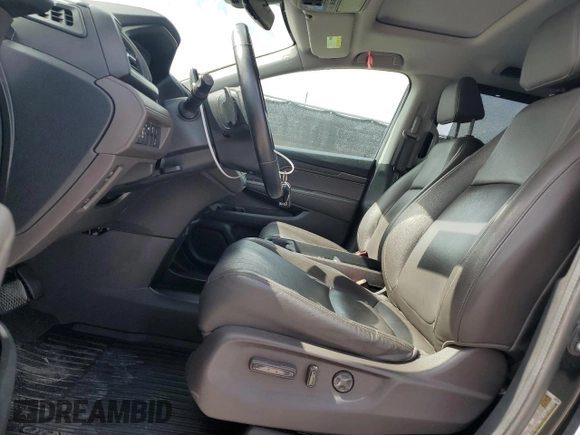 2018 Honda Odyssey EX-L z VIN 5FNRL6H7XJB031245, wystawiony jako Copart lot #59331635 z przebiegiem 74 901 mil mil oraz Czysty tytuł • Clean title. Historia ofert i sprzedaży dostępna na DreamBid. Obrazek 7.