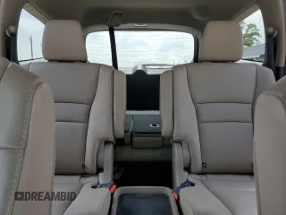 2021 Honda Pilot Touring 7-Passenger z VIN 5FNYF6H68MB077008, wystawiony jako Copart lot #54133735 z przebiegiem 96 052 mil mil oraz Szkoda całkowita • Salvage title. Historia ofert i sprzedaży dostępna na DreamBid. Obrazek 10.