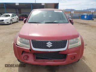 2012 Suzuki Grand Vitara Premium z VIN JS3TD0D20C4101342, wystawiony jako Copart lot #51956595 z przebiegiem 166 710 mil mil oraz Szkody całkowita. Historia ofert i sprzedaży dostępna na DreamBid. Obrazek 5.