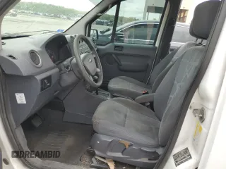 2010 Ford Transit Connect XLT with VIN NM0KS6BNXAT000034, listed as a Copart auction lot 54598985 with 133,444 mi miles and Salvage title. Bid and sale history available at DreamBid. Image 7.