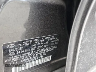 2023 Genesis G70 2.0T with VIN KMTG34TA4PU104352, listed as a Copart auction lot 76000484 with 27,548 mi miles and Salvage Title. Bid and sale history available at DreamBid. Image 13.