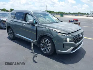 2023 Hyundai Santa Fe Calligraphy z VIN 5NMS54AL8PH605985, wystawiony jako IAAI lot #42334618 z przebiegiem 39 769 mil mil oraz . Historia ofert i sprzedaży dostępna na DreamBid. Obrazek 1.