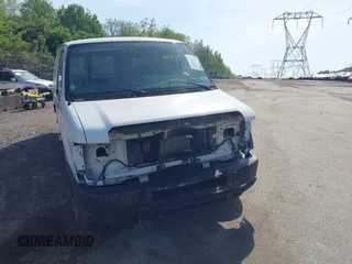 2014 Ford Econoline Cargo Commercial with VIN 1FTNS2EW2EDA83939, listed as a IAAI auction lot 42159453 with 148,947 mi miles. Bid and sale history available at carsss.com. Image 6.