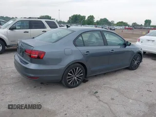 2016 Volkswagen Jetta Sport z VIN 3VWD17AJ8GM292211, wystawiony jako IAAI lot #42371317 z przebiegiem 142 360 mil mil oraz . Historia ofert i sprzedaży dostępna na DreamBid. Obrazek 4.