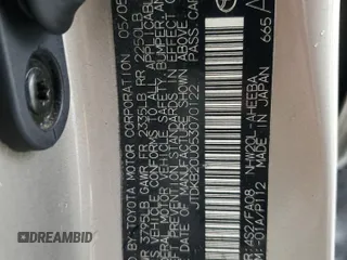 2005 Toyota Prius z VIN JTDKB20U053070122, wystawiony jako Copart lot #86879114 z przebiegiem Nie podano mil oraz Szkoda całkowita • Salvage title. Historia ofert i sprzedaży dostępna na DreamBid. Obrazek 12.