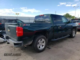2015 Chevrolet Silverado 1500 LT with VIN 3GCUKREC5FG220516, listed as a Copart auction lot 68086854 with 186,924 mi miles and Salvage Title. Bid and sale history available at DreamBid. Image 3.