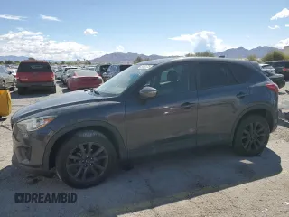 2015 Mazda CX-5 Grand Touring with VIN JM3KE4DY9F0536771, listed as a Copart auction lot 51801775 with 88,529 mi miles and Salvage Title. Bid and sale history available at DreamBid. Image 1.