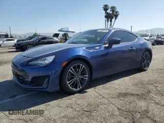 2015 Scion FR-S z VIN JF1ZNAA10F9710645, wystawiony jako Copart lot #57600515 z przebiegiem 57 045 mil mil oraz Szkoda całkowita • Salvage title. Historia ofert i sprzedaży dostępna na DreamBid. Obrazek 1.