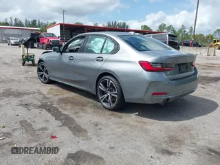 2023 BMW 3 Series 330i with VIN 3MW69FF00P8D61512, listed as a IAAI auction lot 41992509 with 15,809 mi miles and . Bid and sale history available at DreamBid. Image 3.