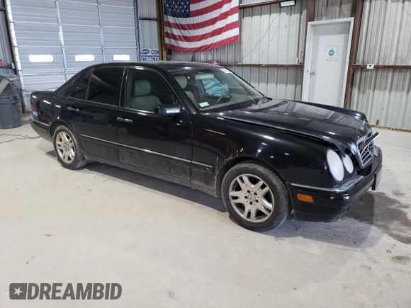 1998 Mercedes-Benz E-Class with VIN WDBJF65FXWA648112, listed as a Copart auction lot 47074665 with 0 mi miles and Salvage Title. Bid and sale history available at carsss.com. Image 4.