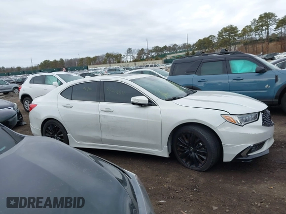 2019 Acura TLX w/Advance Pkg with VIN 19UUB3F84KA003847, listed as a IAAI auction lot 41735006 with 999,999 mi miles. Bid and sale history available at carsss.com. Image 12.