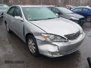 2004 Toyota Camry LE with VIN 4T1BF30K14U578385, listed as a IAAI auction lot 41547709 with 217,434 mi miles. Bid and sale history available at carsss.com. Image 1.