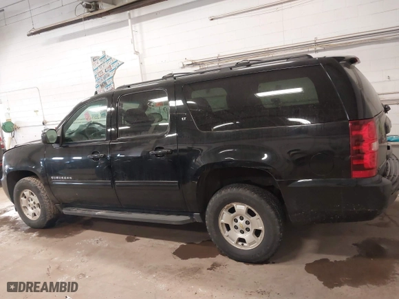 2013 Chevrolet Suburban LT with VIN 1GNSKJE75DR167705, listed as a IAAI auction lot 41521409 with 228,411 mi miles. Bid and sale history available at carsss.com. Image 14.