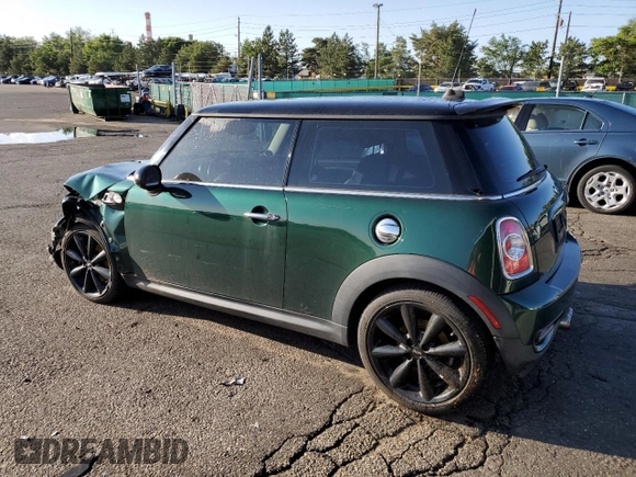 2013 MINI Hardtop S with VIN WMWSV3C59DT475621, listed as a Copart auction lot 62295405 with 108,782 mi miles and Salvage title. Bid and sale history available at DreamBid. Image 2.